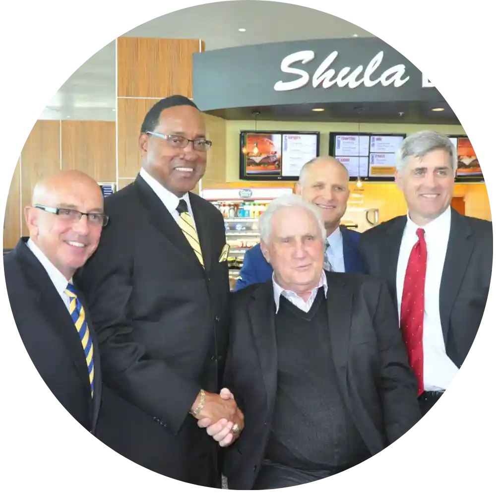 Image of George Tinsley with Coach Don Shula at Restaurant Opeing