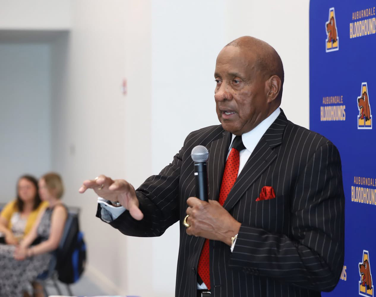 Image of George Tinsley Speaking and Gesturing.