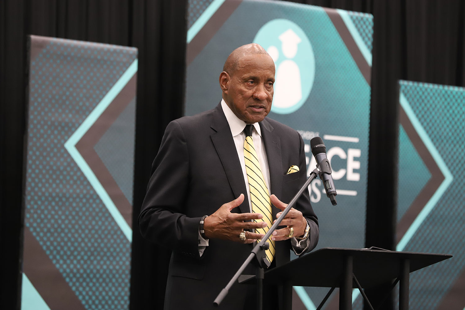 Image of George Tinsley Sr. with his chin resting on his left fist.